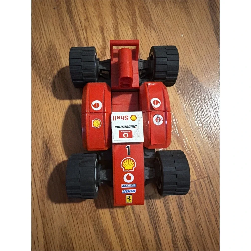Red Lego Ferrari Bridgestone Shell Four-Wheel Car